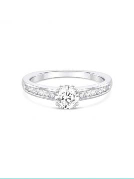 Contemporary engagement ring with central claw setting and channel set diamond shoulders(with G/VS2 diamond)